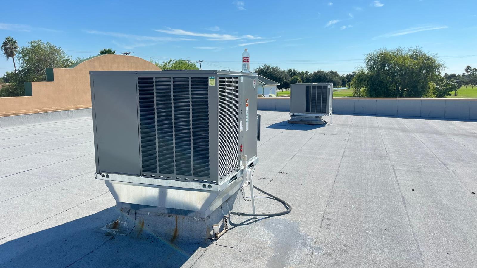 Rooftop AC unit maintained by Climate Heating & Cooling for a property in the Rio Grande Valley