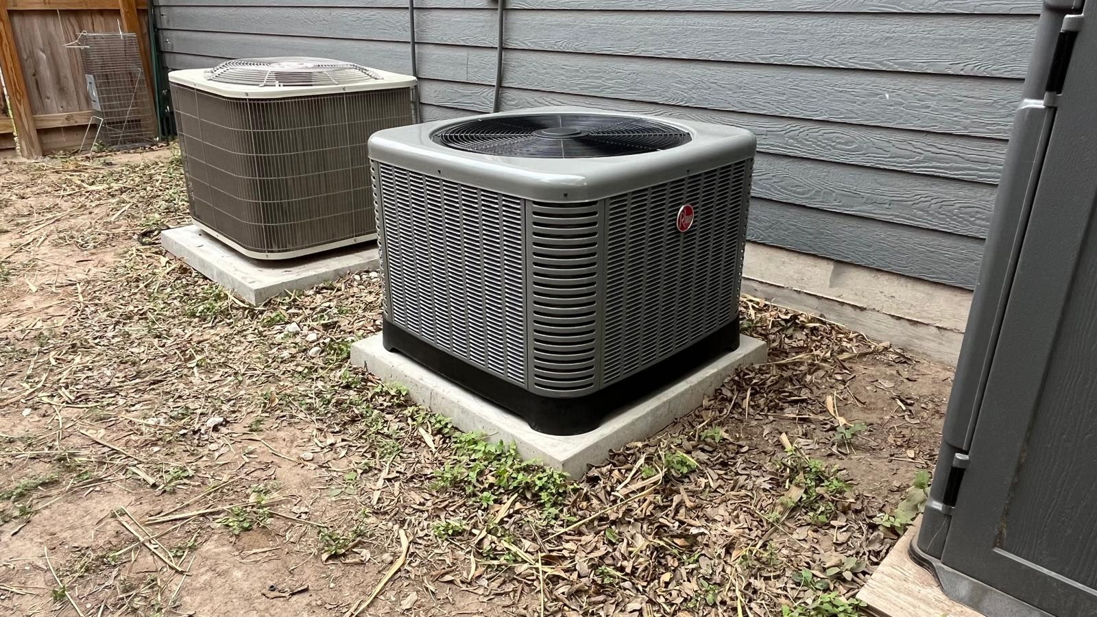 Climate Heating & Cooling technician repairing a residential AC condenser unit at a Mission, TX home